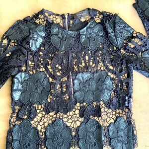NWOT Gracia leather and lace blouse with zipper back. Size S.